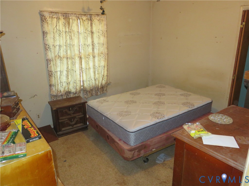 4292 Range Road Mechanicsville, VA 23111 - Photo 15 of 50 a bedroom with a bed and a window