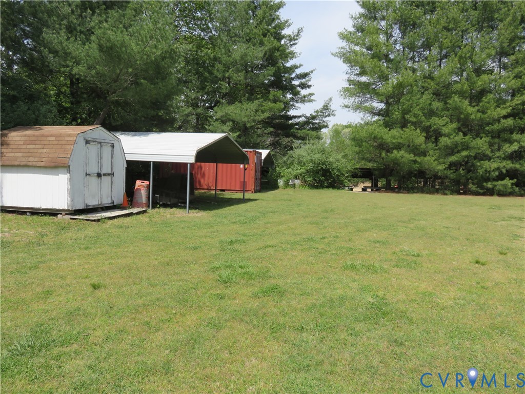 4292 Range Road Mechanicsville, VA 23111 - Photo 33 of 50 a view of a house with a yard and sitting area