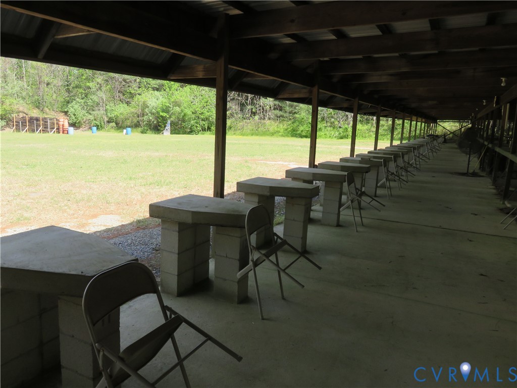 4292 Range Road Mechanicsville, VA 23111 - Photo 34 of 50 a view of an chairs and table in patio