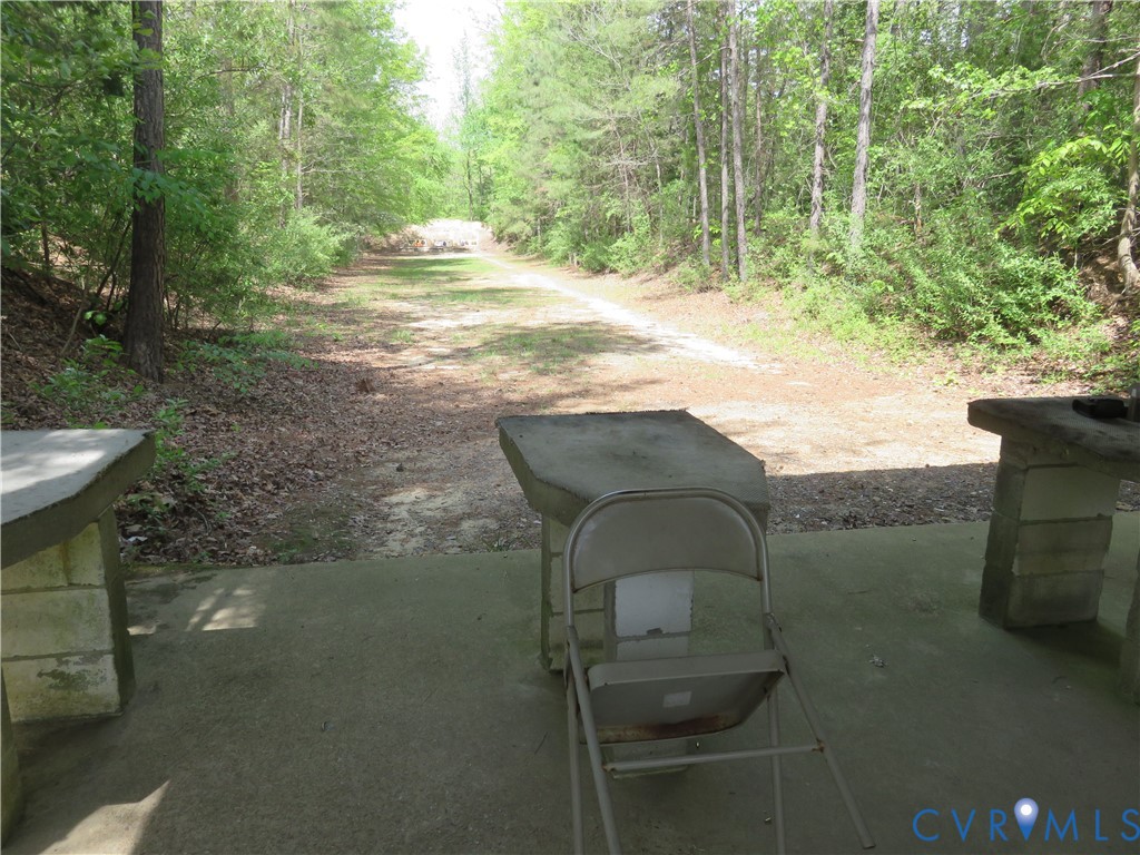 4292 Range Road Mechanicsville, VA 23111 - Photo 39 of 50 a backyard of a house with table and chairs