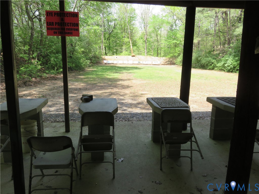 4292 Range Road Mechanicsville, VA 23111 - Photo 40 of 50 a view of a chairs and table in patio