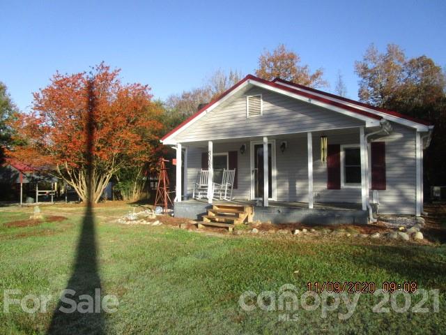 3018 Goldmine Road Monroe, NC 28110 - Photo 2 of 33 a front view of a house with garden