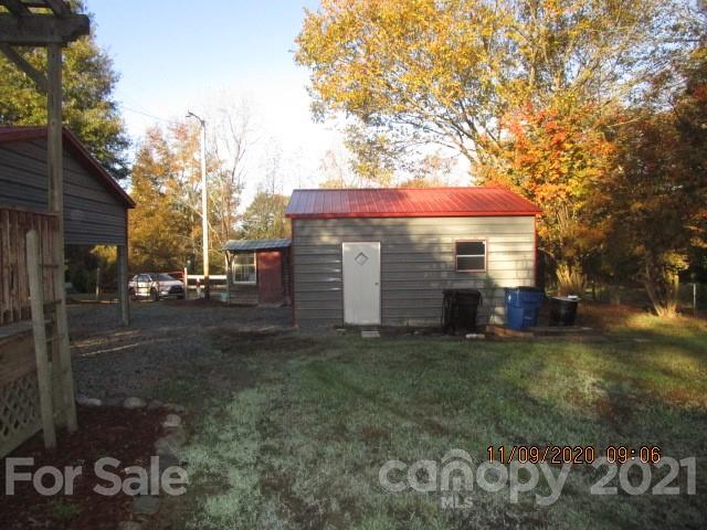 3018 Goldmine Road Monroe, NC 28110 - Photo 11 of 33 a view of a house with a yard