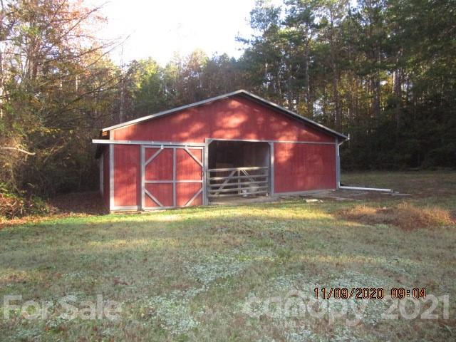 3018 Goldmine Road Monroe, NC 28110 - Photo 13 of 33 a front view of a house with a yard