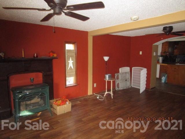 3018 Goldmine Road Monroe, NC 28110 - Photo 16 of 33 a living room with furniture and a fireplace