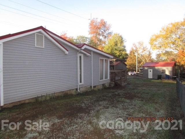 3018 Goldmine Road Monroe, NC 28110 - Photo 3 of 33 a backyard of a house