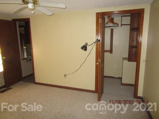 3018 Goldmine Road Monroe, NC 28110 - Photo 29 of 33 a view of a hallway with a door