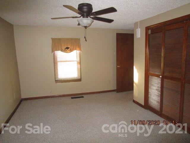 3018 Goldmine Road Monroe, NC 28110 - Photo 30 of 33 an empty room with windows