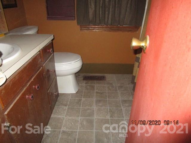 3018 Goldmine Road Monroe, NC 28110 - Photo 31 of 33 a bathroom with a sink and a toilet