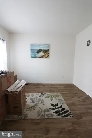 a view of a livingroom with furniture