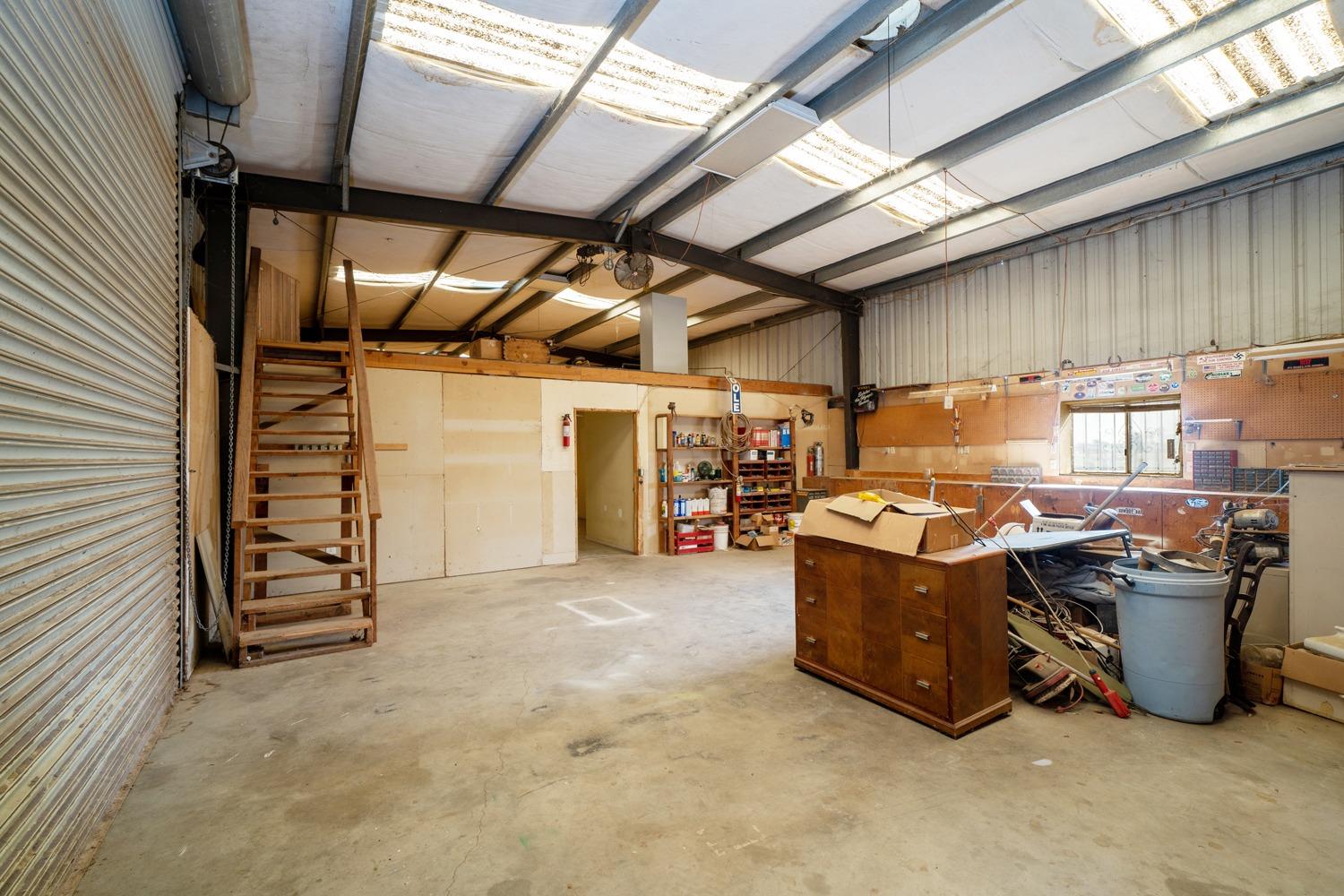 26166 Eddy Way Madera, CA 93638 - Photo 15 of 25 a view of a storage room with an empty space