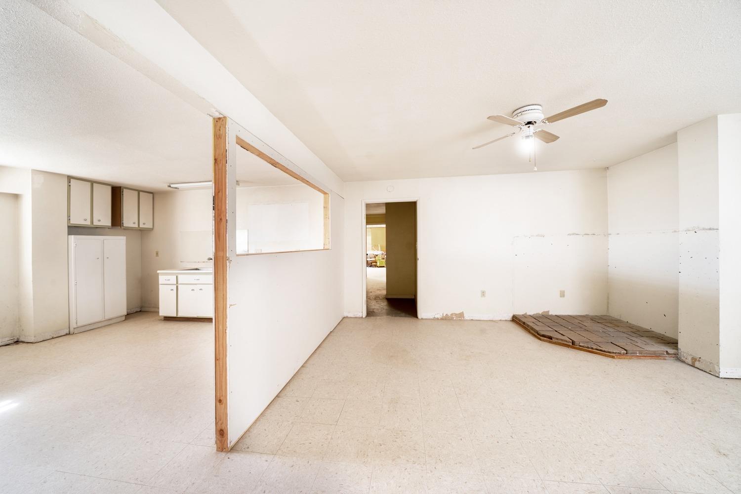 26166 Eddy Way Madera, CA 93638 - Photo 20 of 25 a view of an empty room with a kitchen