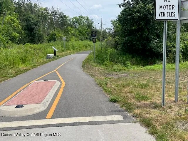 a view of a city street from a balcony