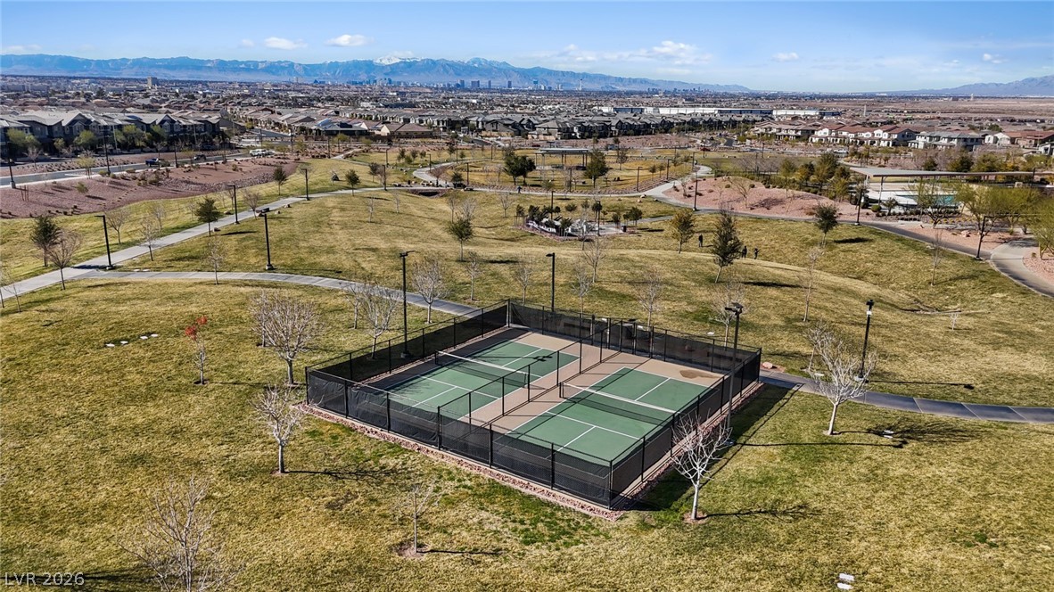 250 Dedication Avenue Henderson, NV 89011 - Photo 51 of 67 Aerial view of residential area with a mountainous background