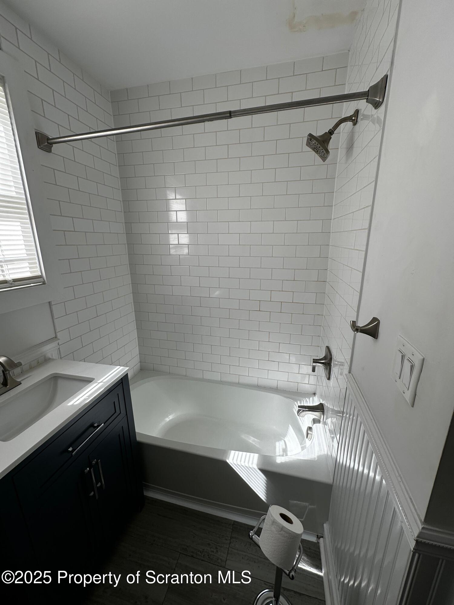 1417 Cornell Street, Unit 2 Scranton, PA 18504 - Photo 3 of 11 a bathroom with a sink a toilet and shower