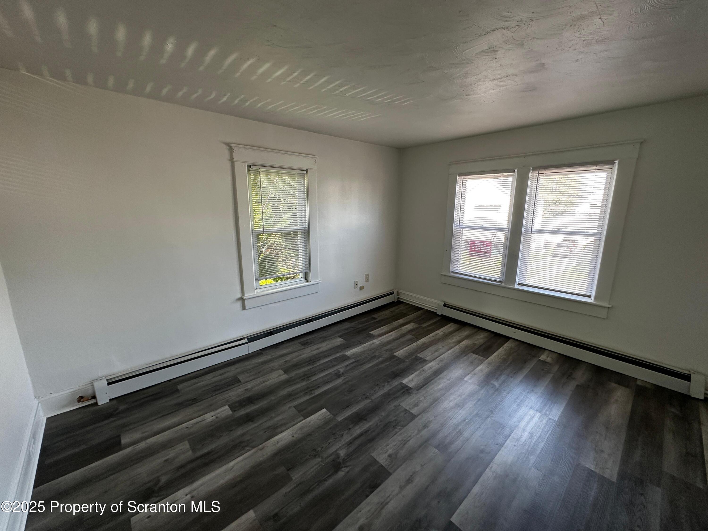 1417 Cornell Street, Unit 2 Scranton, PA 18504 - Photo 9 of 11 a view of an empty room and wooden floor