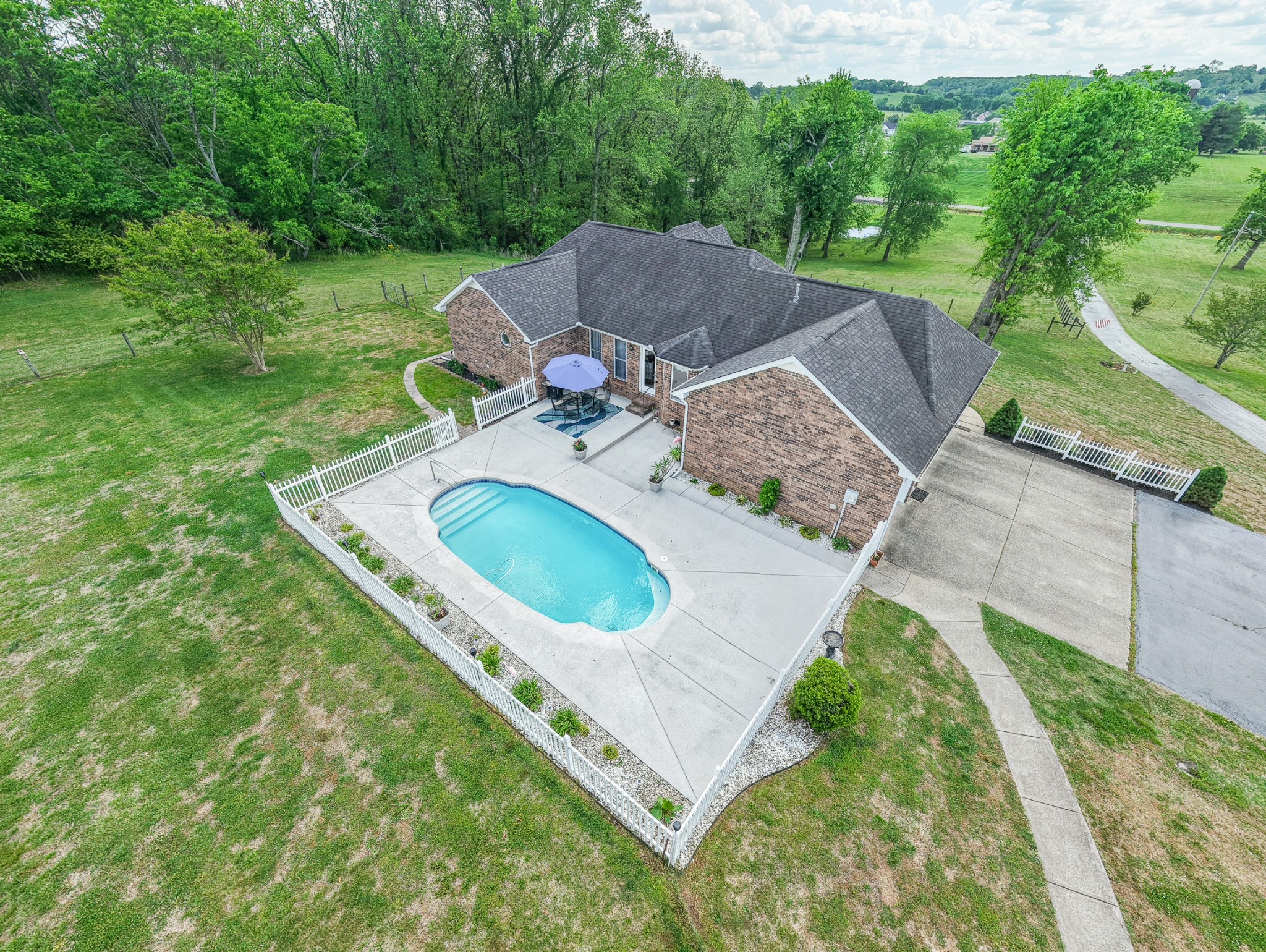 590 Allisona Road Eagleville, TN 37060 - Photo 45 of 55 an aerial view of a house with garden space and street view