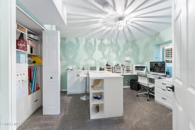 a bathroom with a granite countertop sink mirror and double