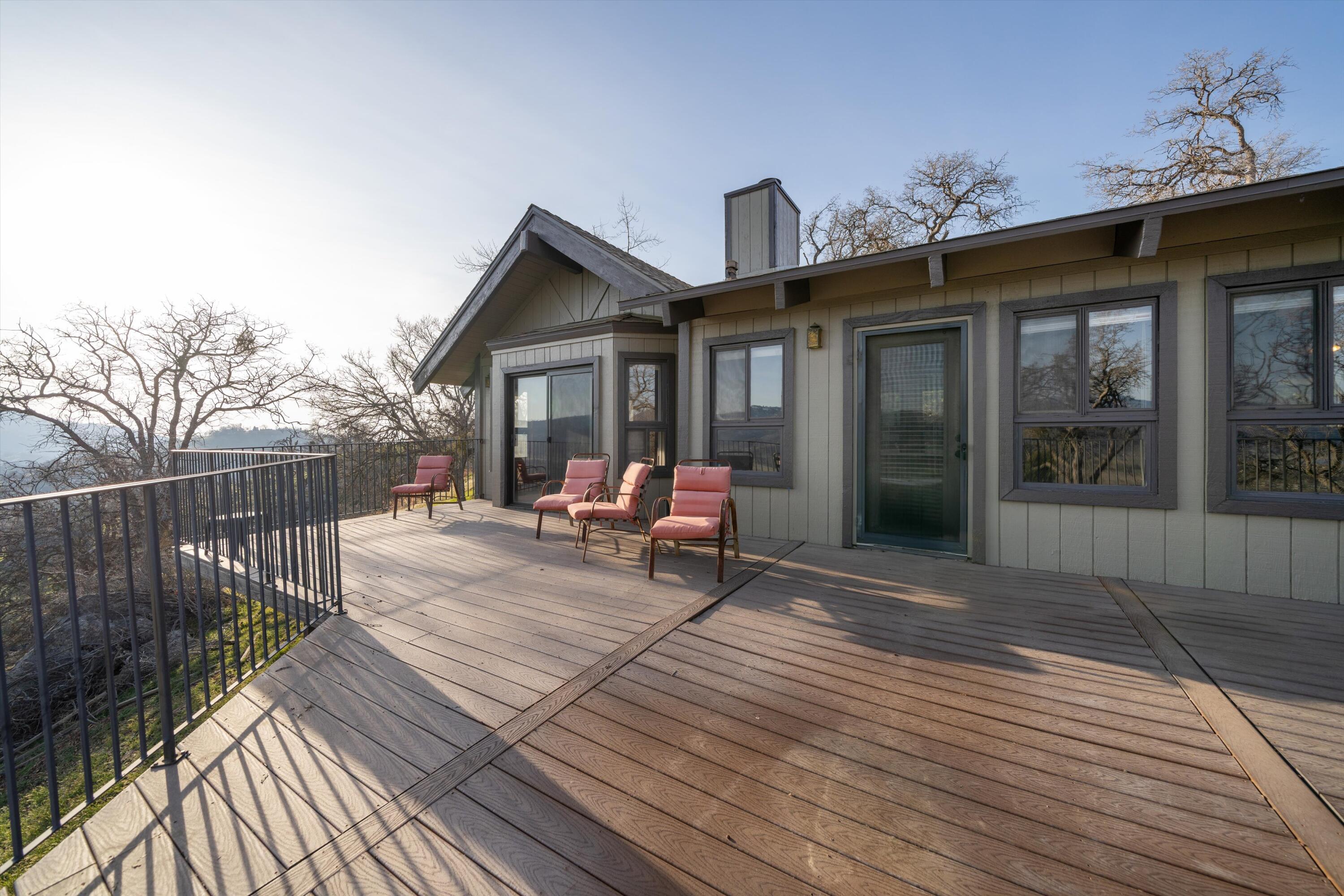 24701 Deertrail Drive Tehachapi, CA 93561 - Photo 17 of 24 a view of a house with sitting area and wooden floor
