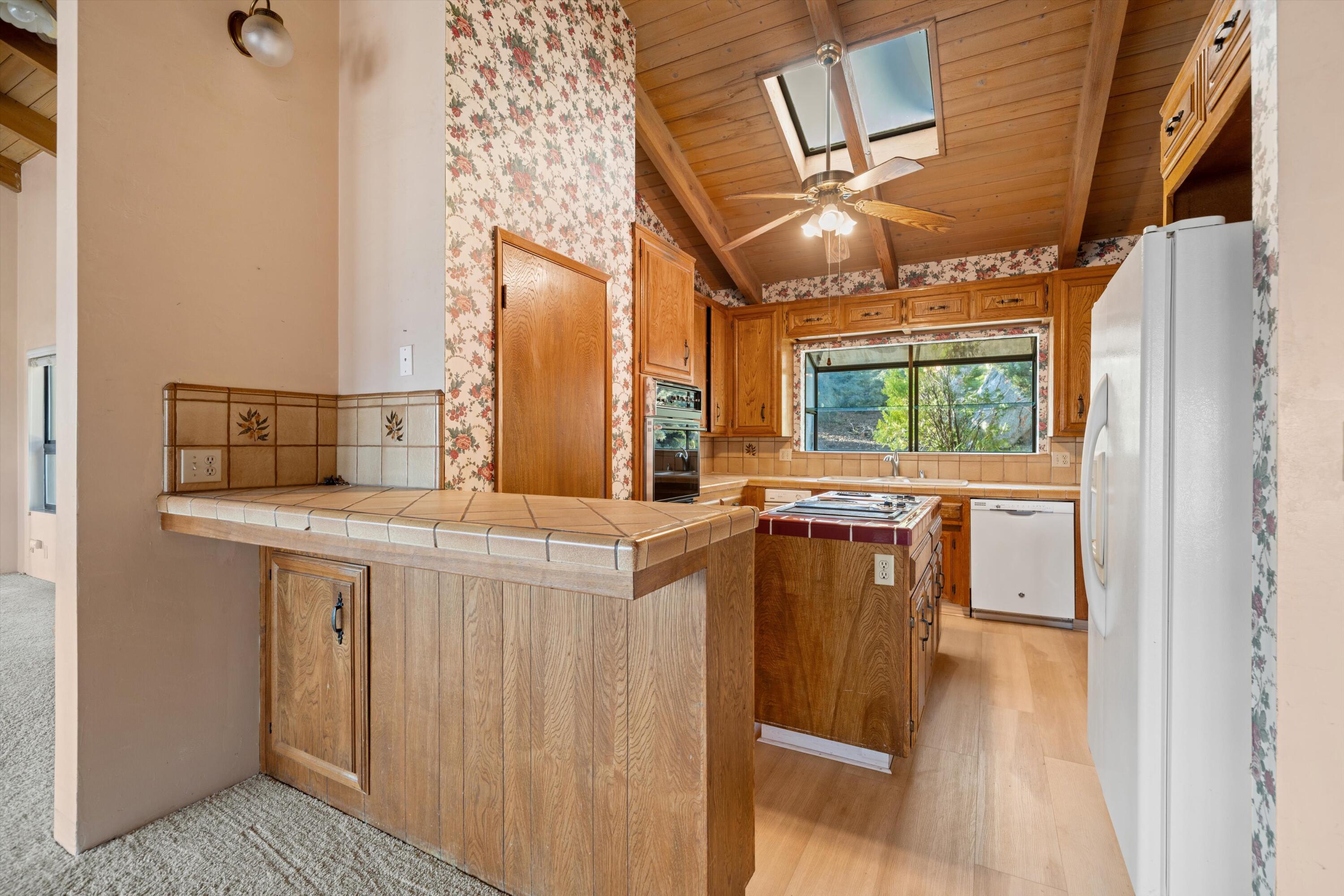 24701 Deertrail Drive Tehachapi, CA 93561 - Photo 4 of 24 a bathroom with a sink and a mirror