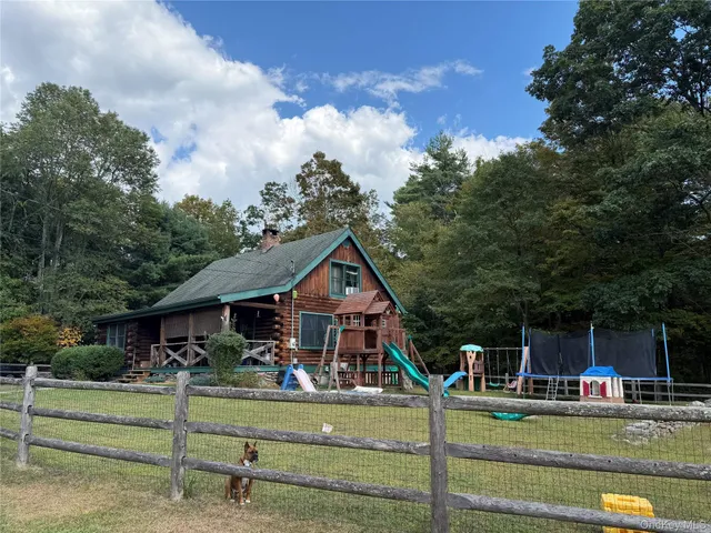 front view of house with a yard
