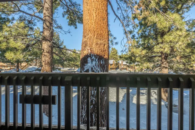 a view of balcony with wooden floor