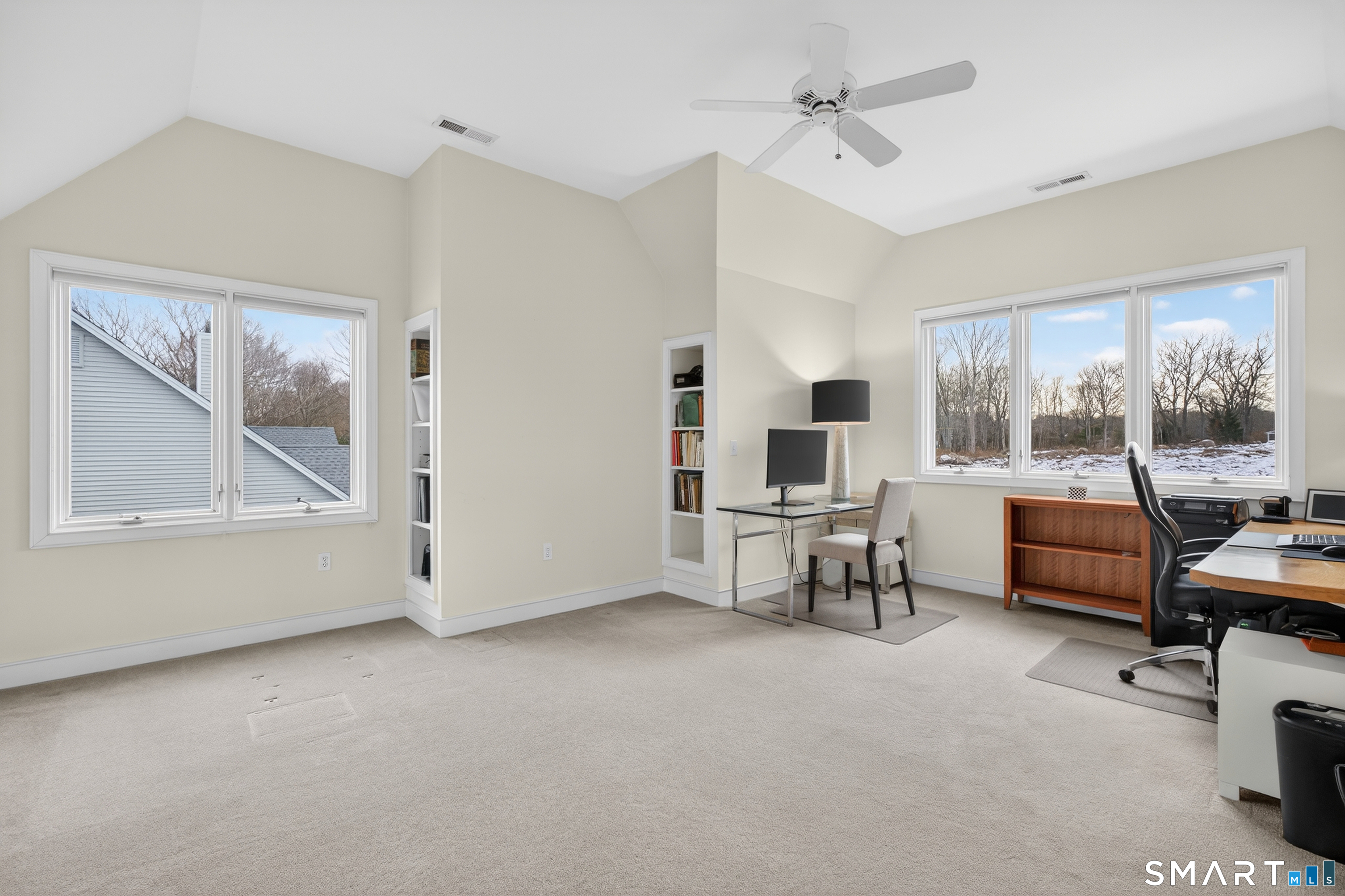 83 Old North Road Stonington, CT 06355 - Photo 27 of 40 a view of a livingroom with furniture and a window