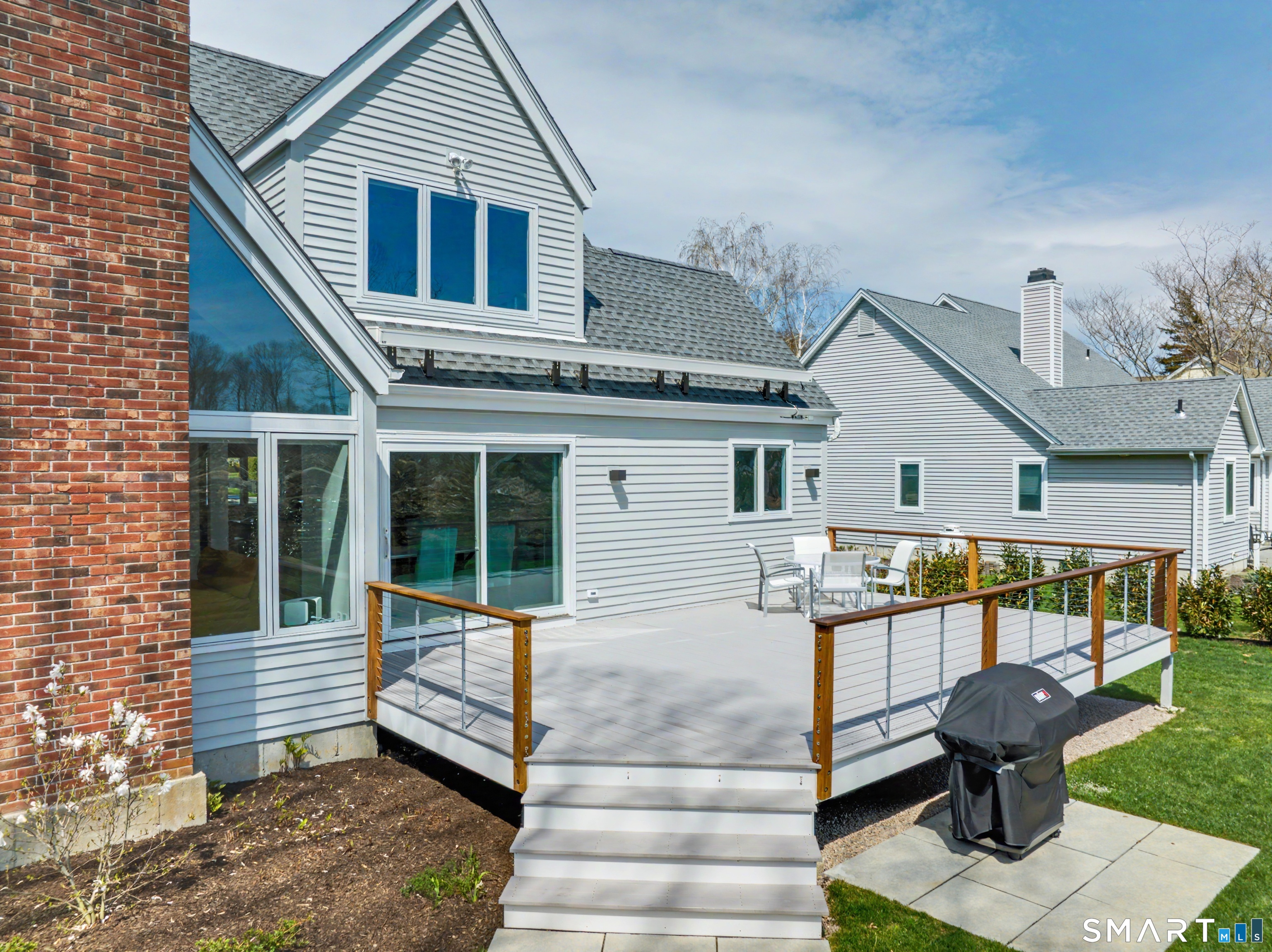 83 Old North Road Stonington, CT 06355 - Photo 35 of 40 a view of a house with wooden floor and a potted plant