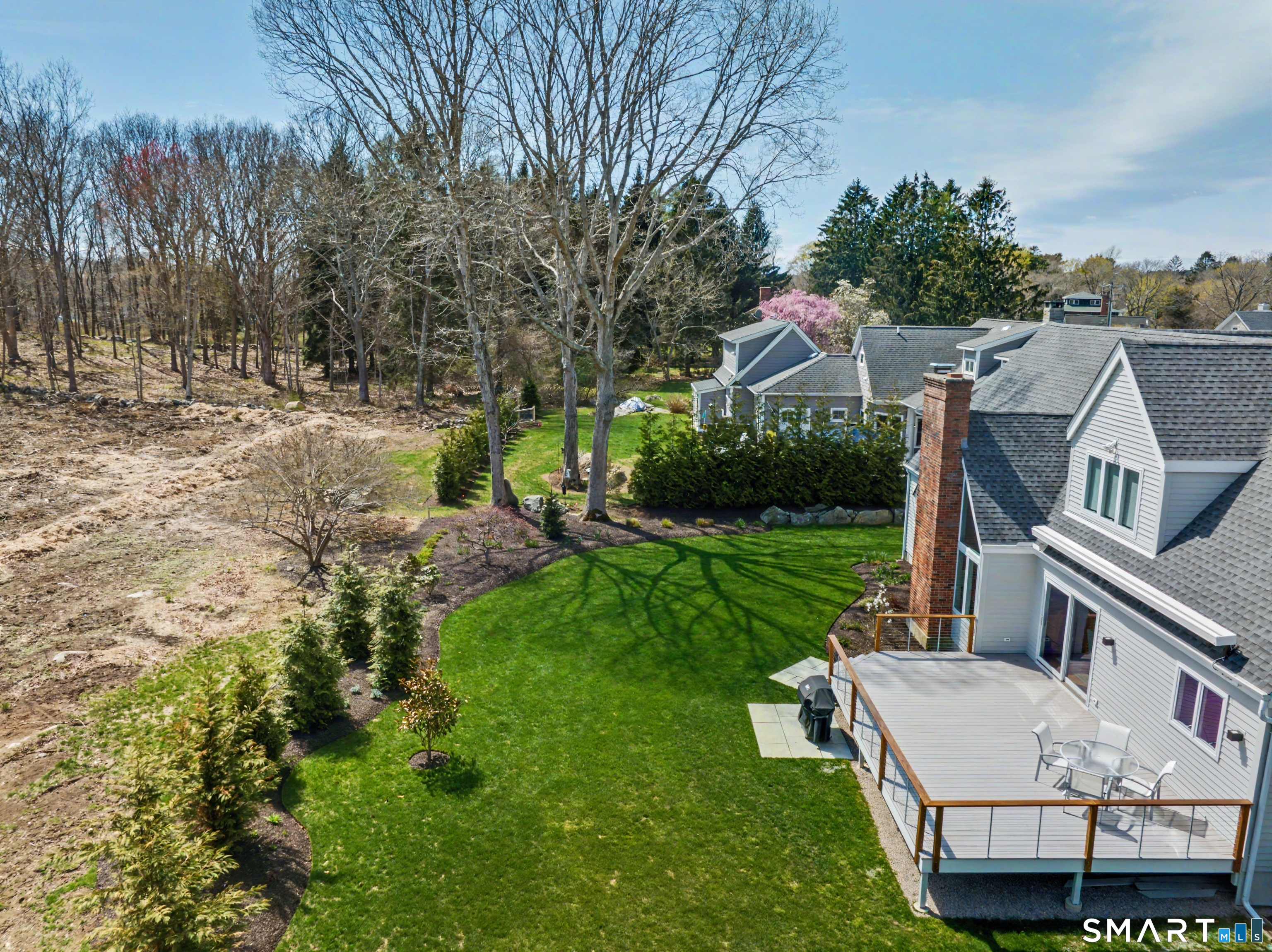 83 Old North Road Stonington, CT 06355 - Photo 38 of 40 a view of house with a yard and sitting area