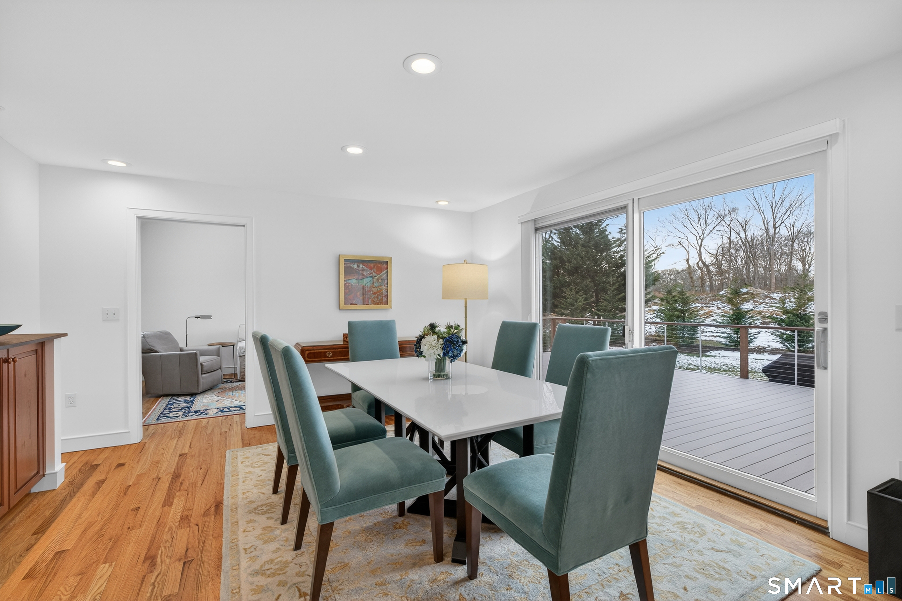 83 Old North Road Stonington, CT 06355 - Photo 7 of 40 a view of a dining room with furniture window and wooden floor
