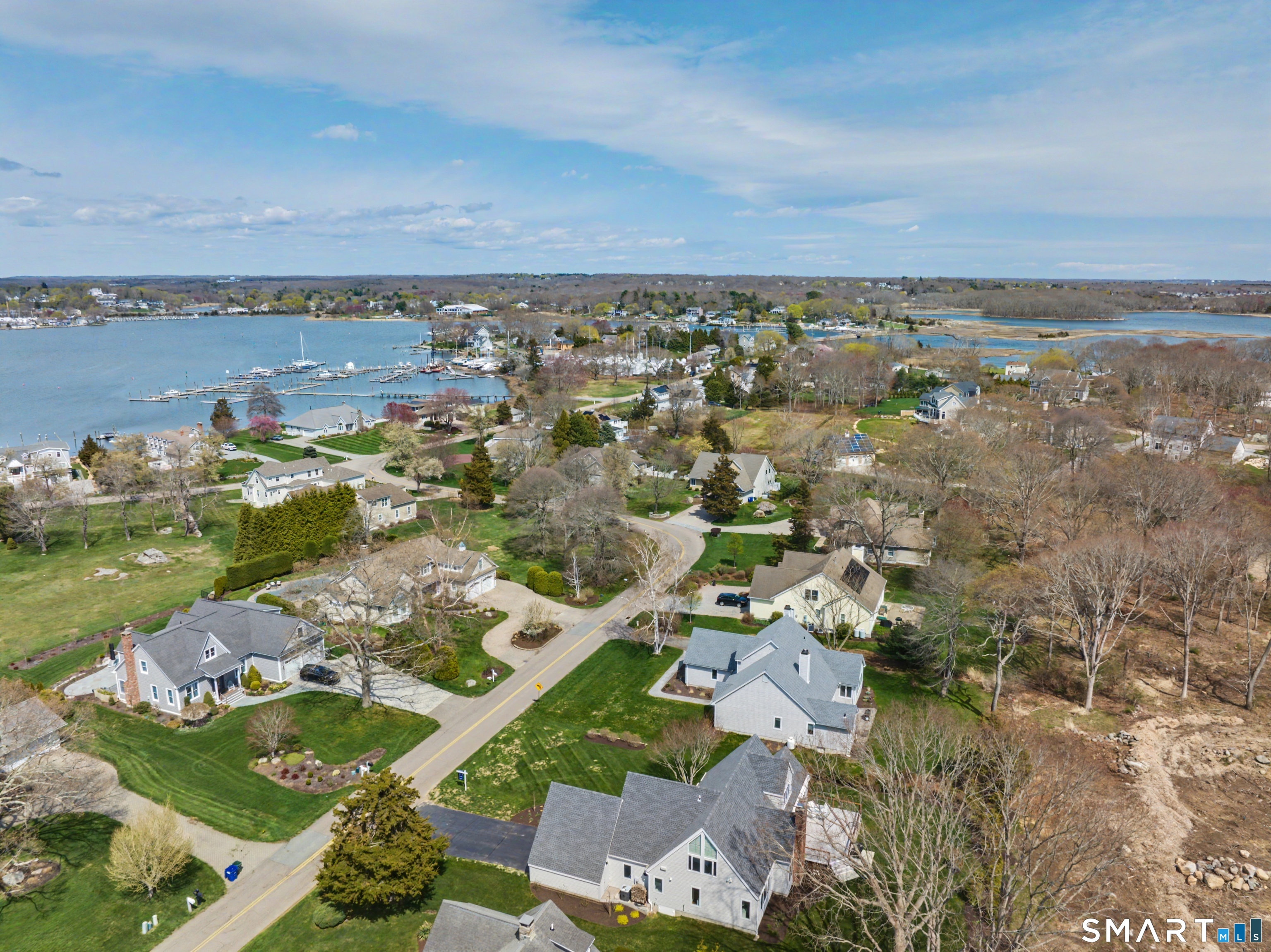 83 Old North Road Stonington, CT 06355 - Photo 8 of 40 an aerial view of a city with lots of residential buildings