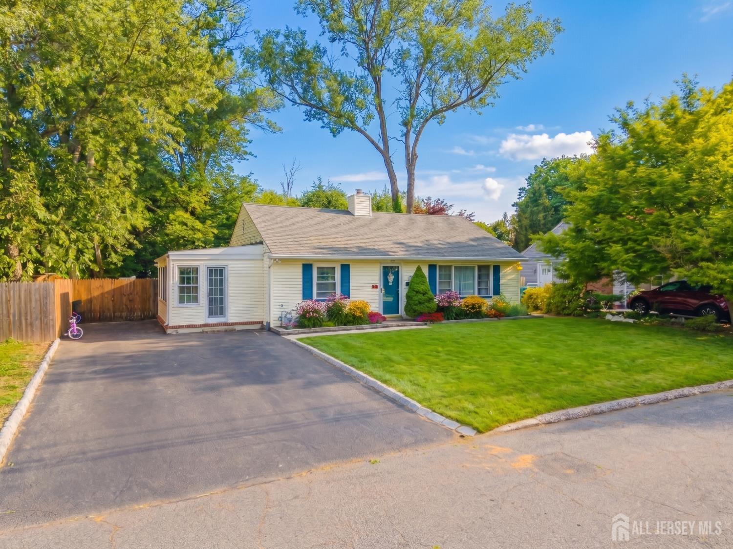 12 Pierrepont Avenue Middlesex, NJ 08846 - Photo 2 of 30 a front view of a house with a garden