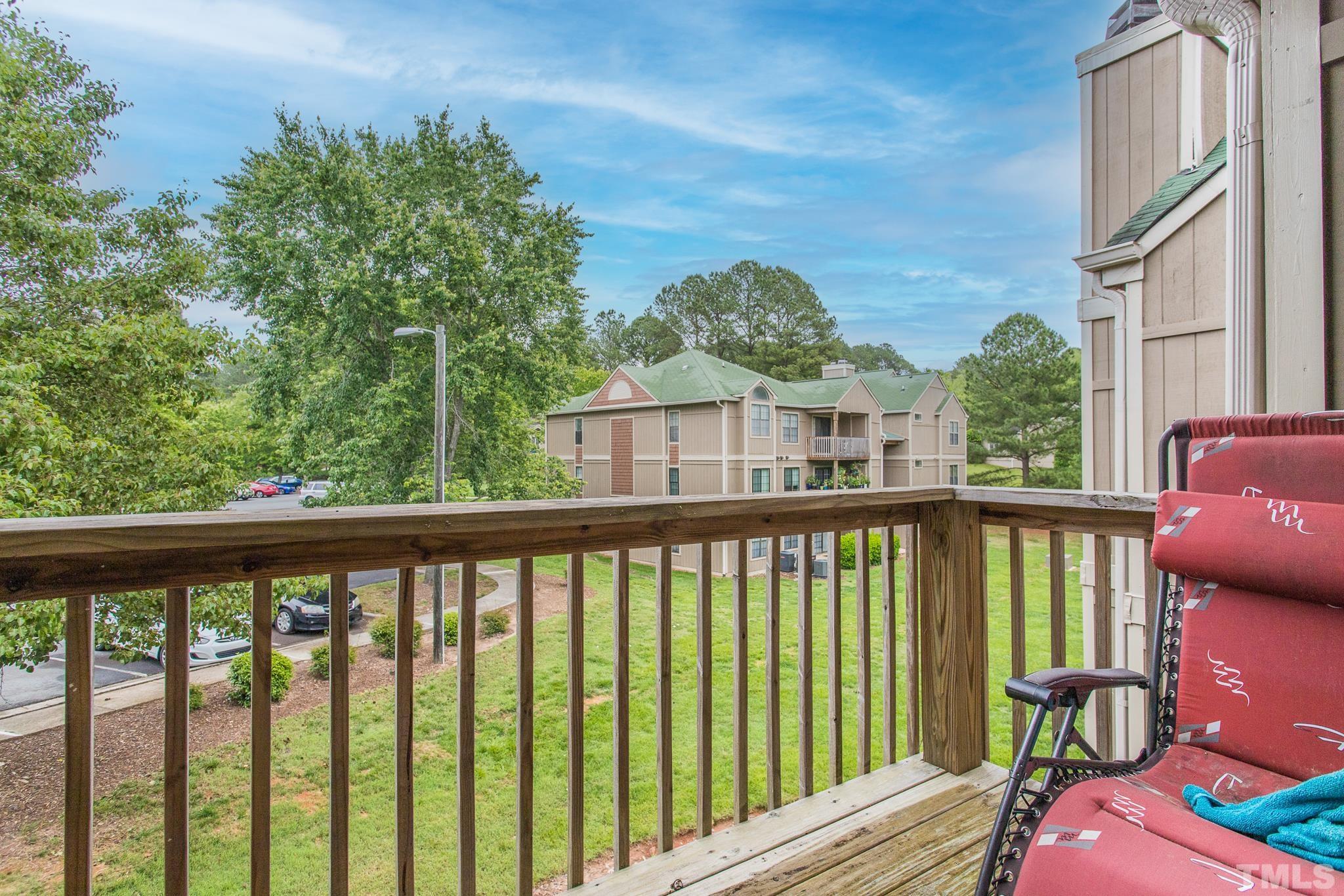3706 Chimney Ridge Place, Unit 205 Durham, NC 27713 - Photo 6 of 18 a view of a balcony with wooden floor