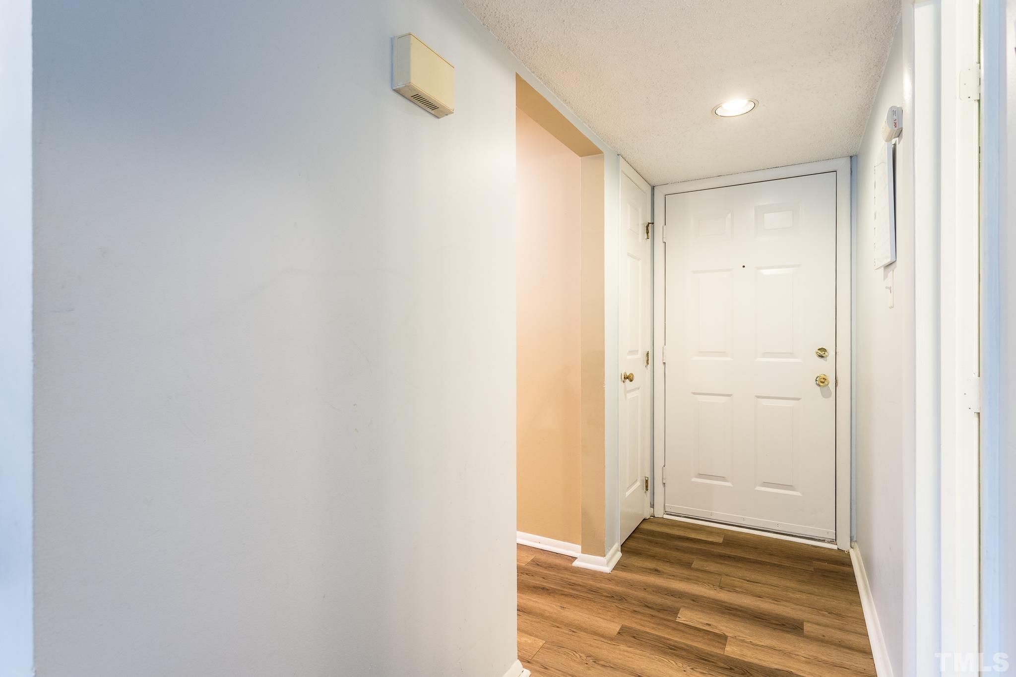 3706 Chimney Ridge Place, Unit 205 Durham, NC 27713 - Photo 8 of 18 a view of wooden floor