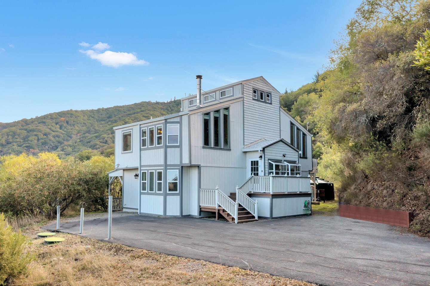 17255 Soda Springs Road Los Gatos, CA 95033 - Photo 1 of 52 a view of a house with a yard