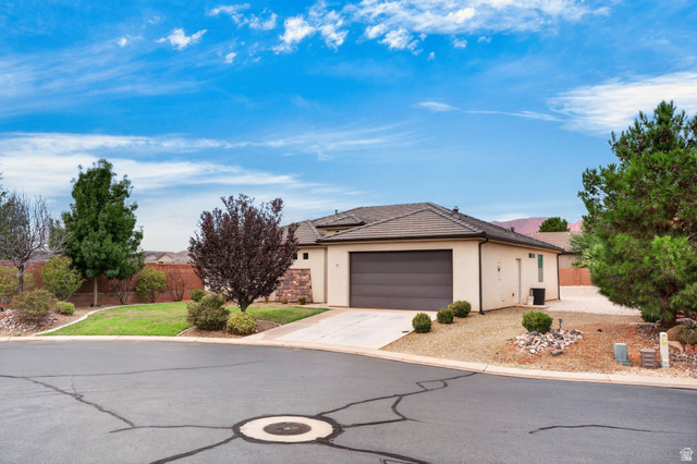 11 East 640 South Ivins, UT 84738 - Photo 43 of 44 Contemporary stucco exterior with a tiled roof