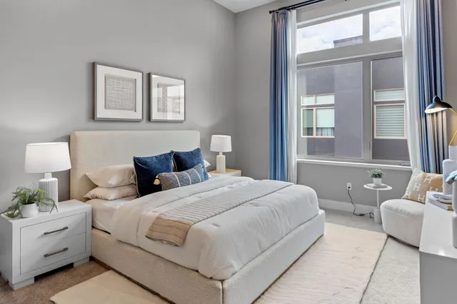 a bathroom with a shower sink and mirror
