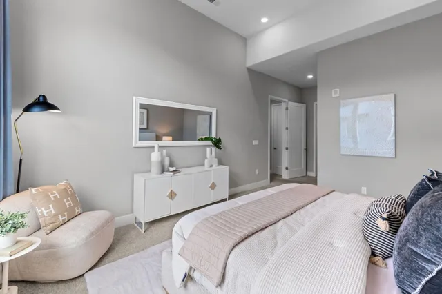 a bathroom with a double vanity sink a mirror and shower