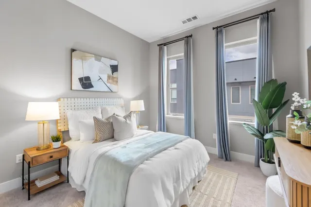 a living room with large windows