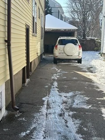 a car parked in front of a house