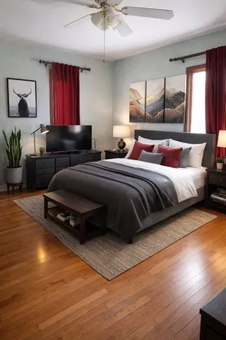 a bedroom with a bed window and couch