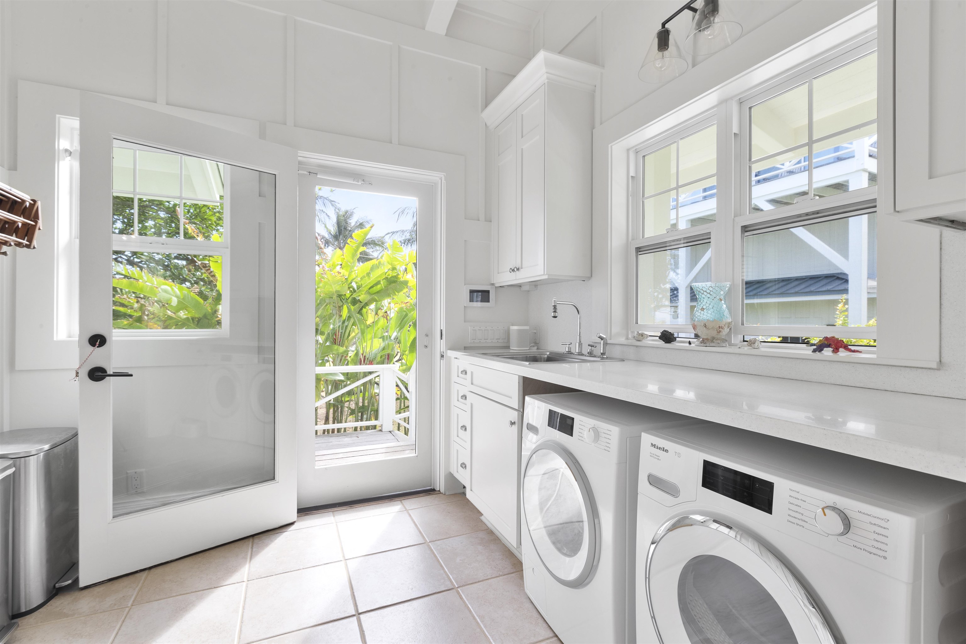 51 Kapohue Road Hana, HI 96713 - Photo 32 of 50 a kitchen with a sink and a window