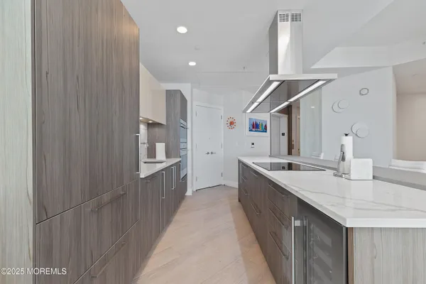 a kitchen with counter top space sink and center
