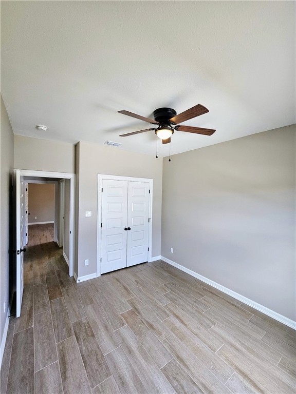 507 West Ragland Avenue Kingsville, TX 78363 - Photo 13 of 17 wooden floor in an empty room
