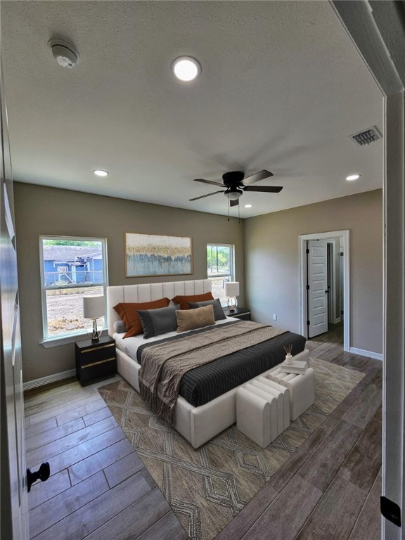 507 West Ragland Avenue Kingsville, TX 78363 - Photo 4 of 17 a bedroom with a large bed and a tv