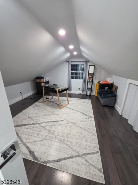 569 Harvard Avenue, Unit 1 Hillside, NJ 07205 - Photo 12 of 18 a living room with furniture and a wooden floor