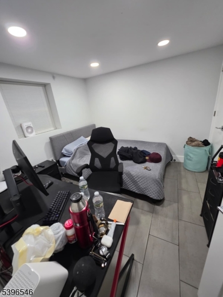 569 Harvard Avenue, Unit 1 Hillside, NJ 07205 - Photo 15 of 18 a living room with furniture