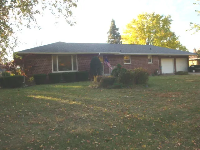 front view of house with a yard