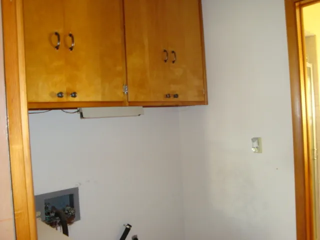 a bathroom with a tub and a shower