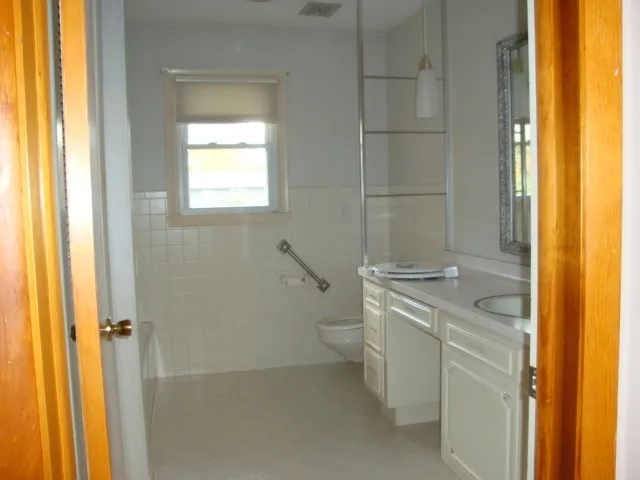 an empty room with window